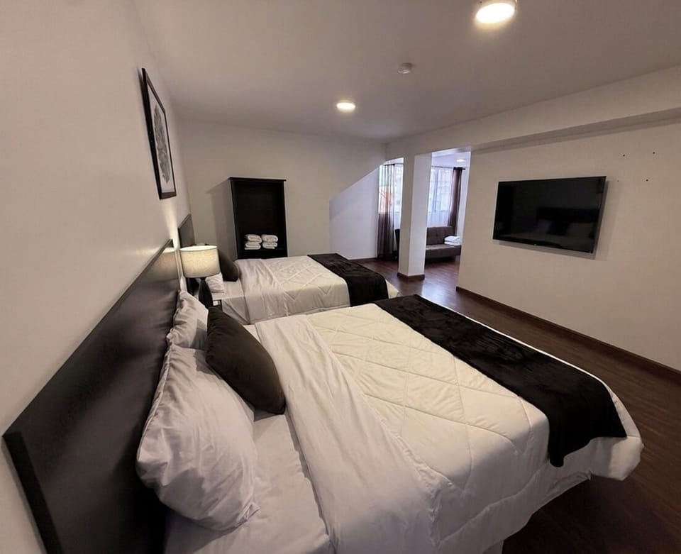 Superior Triple Room | Desk, laptop workspace, blackout drapes, soundproofing