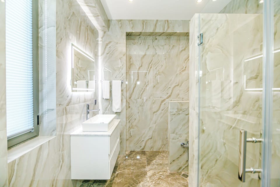 Basic Double or Twin Room, City View | Bathroom | Shower, hair dryer, towels, soap