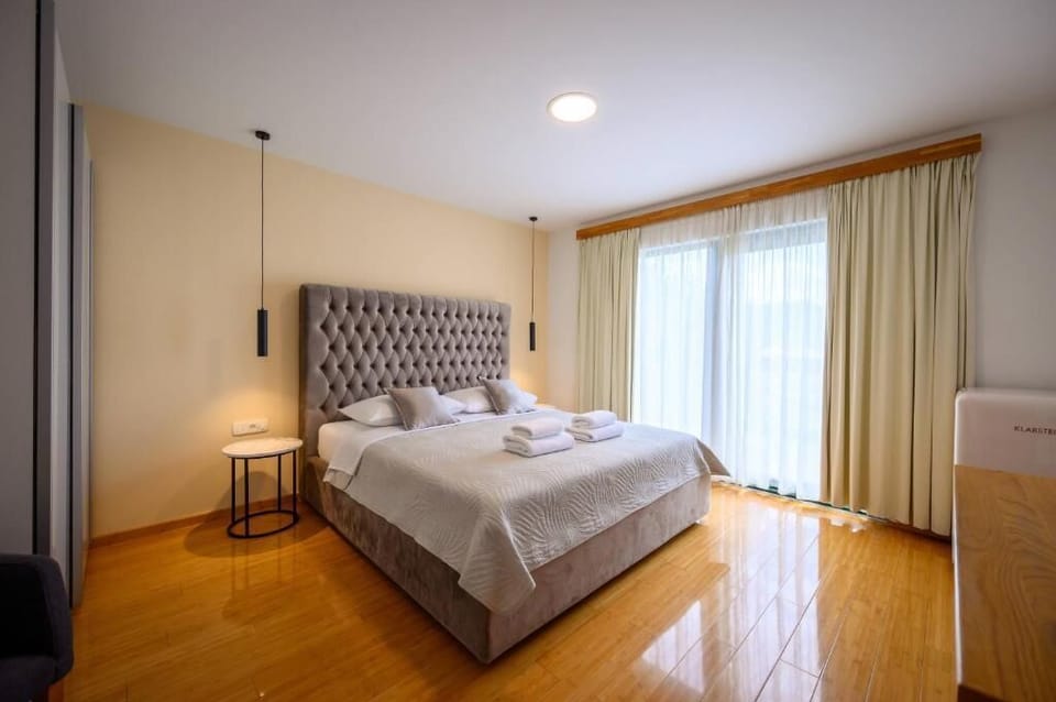 Deluxe Double Room, Balcony | In-room safe, desk, laptop workspace, blackout drapes