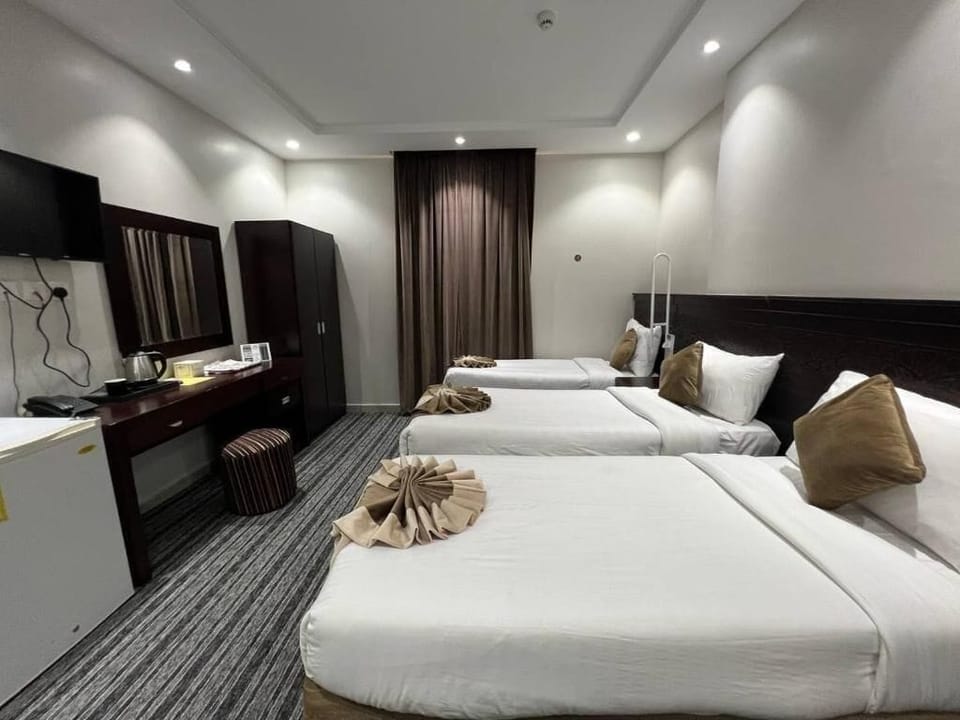 Triple Room, Balcony, City View | In-room safe, blackout drapes, iron/ironing board, free WiFi