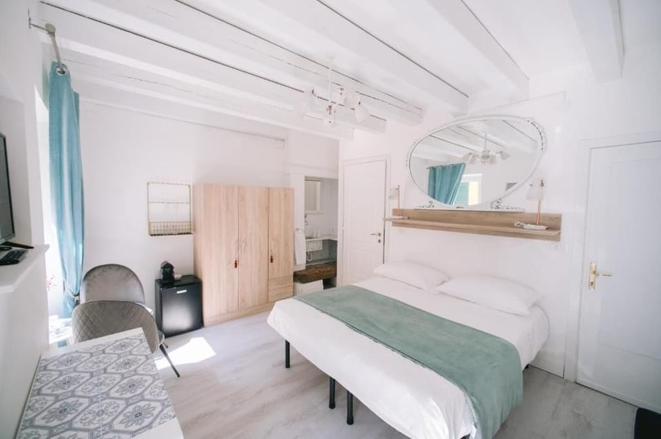 Standard Double Room | Minibar, iron/ironing board, free WiFi