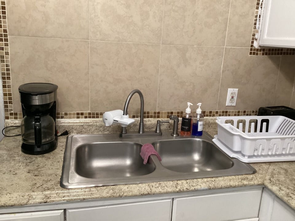 Condo, Balcony, Garden View | Private kitchen | Full-size fridge, microwave, oven, stovetop