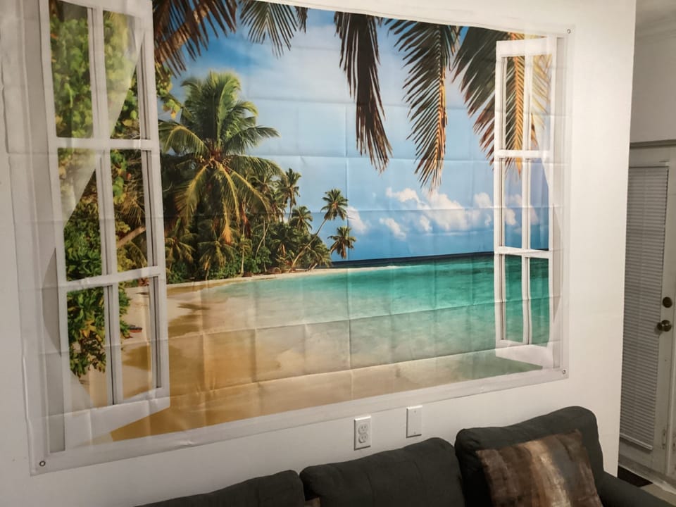Condo, Balcony, Garden View | Living area | 32-inch LCD TV with satellite channels
