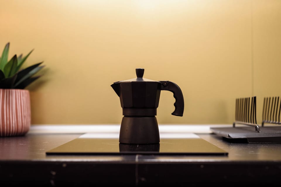 Apartment (1 Bedroom) | Private kitchen | Oven, stovetop, espresso maker, cookware/dishes/utensils