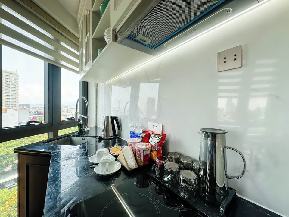 Deluxe Double Room, City View | Minibar, desk, laptop workspace, blackout drapes