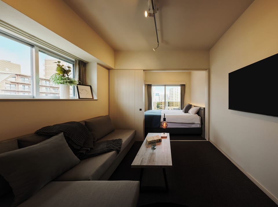 Double Room | Living area | 50-inch TV with digital channels