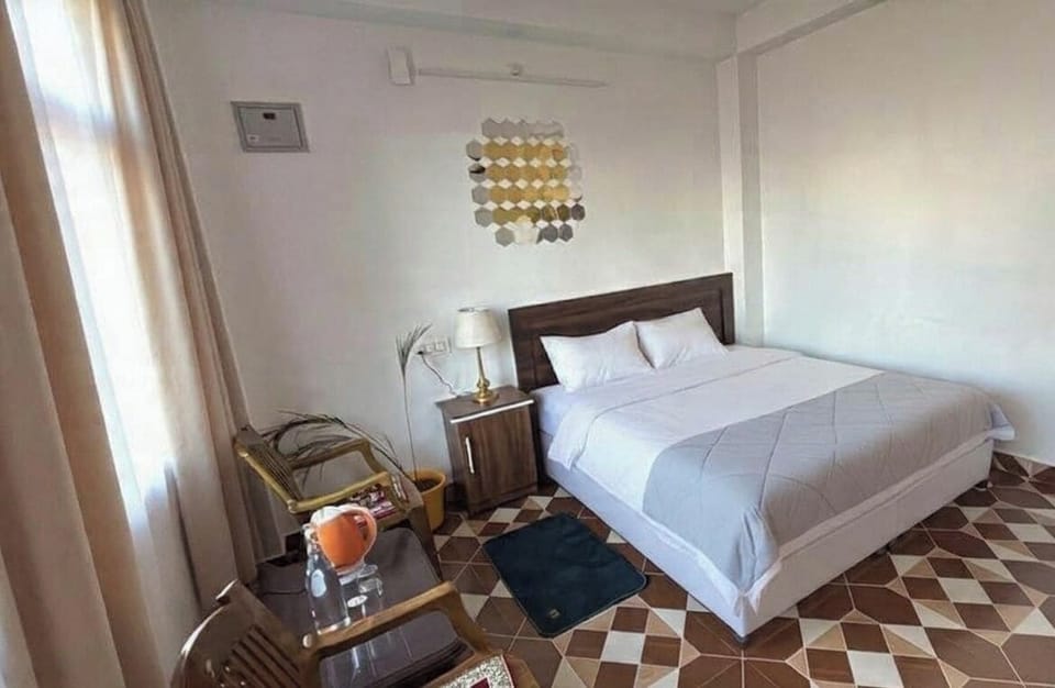 Family Double Room, Balcony, Mountain View | In-room safe, desk, laptop workspace, iron/ironing board