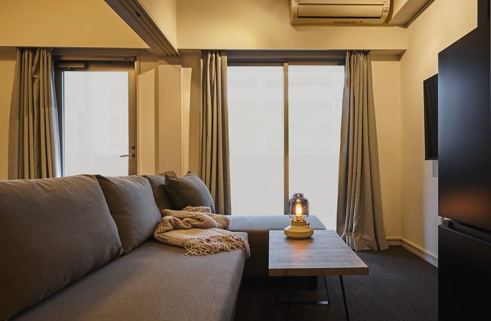 Double Room | Living area | Flat-screen TV