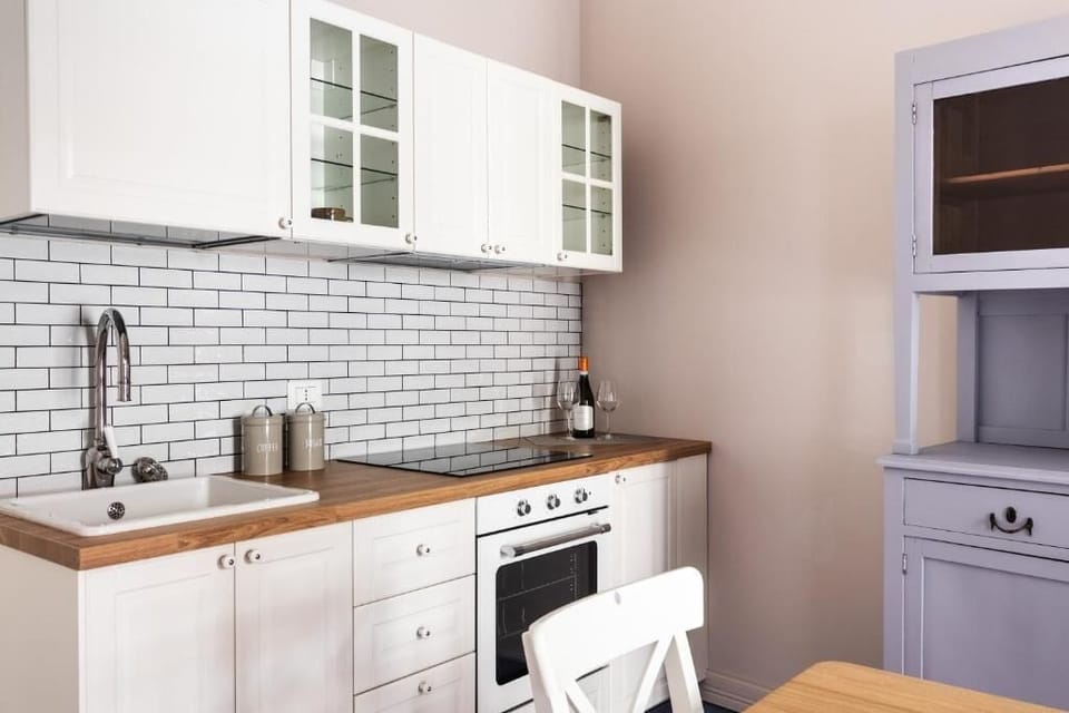 Premium Apartment, Balcony | Private kitchen | Espresso maker, coffee/tea maker, electric kettle, cleaning supplies