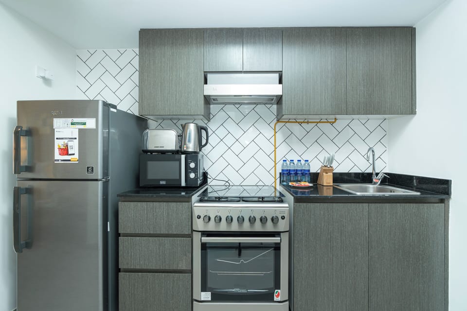 Exclusive Studio, Non Smoking, City View | Private kitchen | Full-size fridge, microwave, oven, stovetop