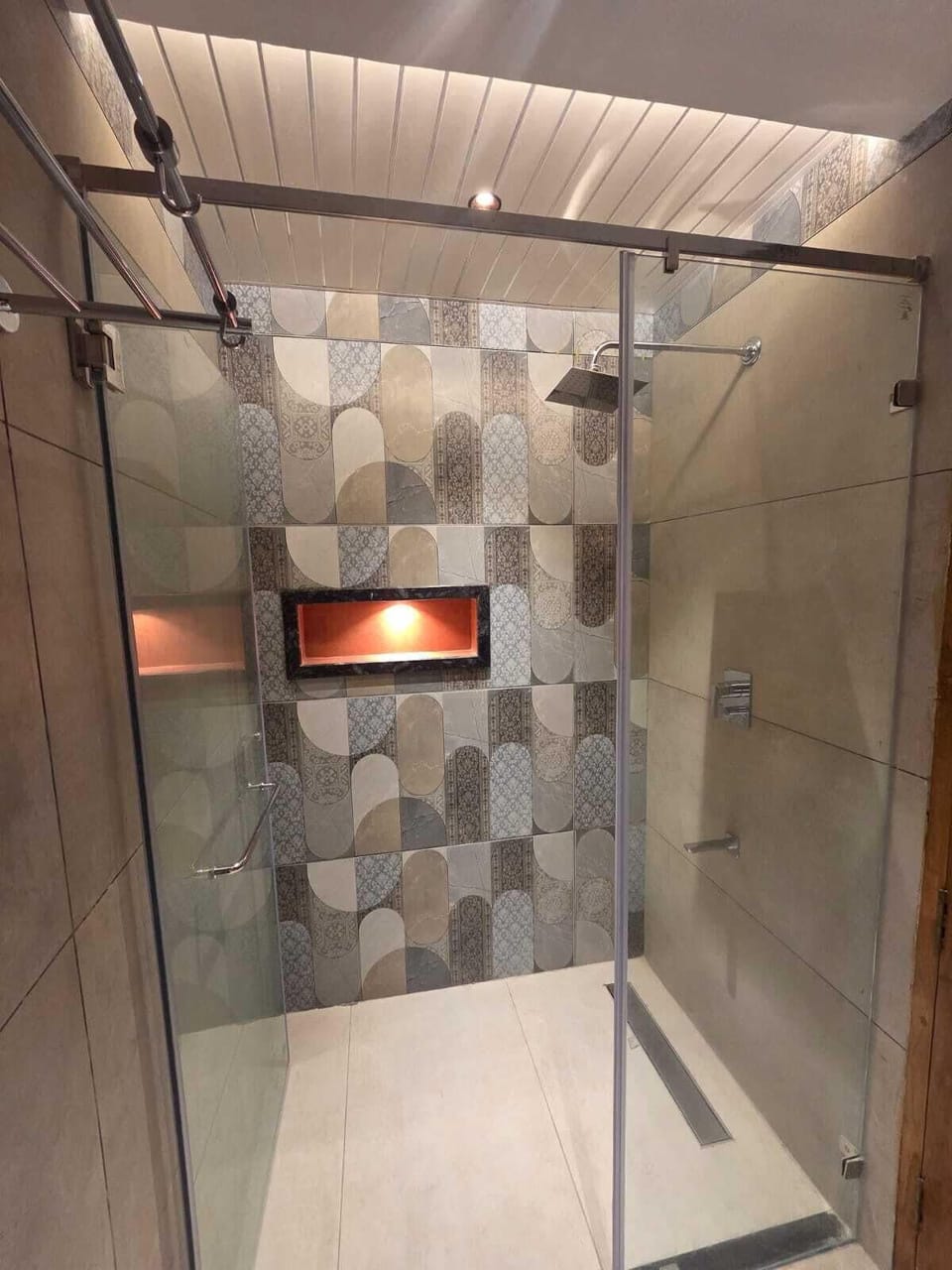 Shower, rainfall showerhead, slippers, towels
