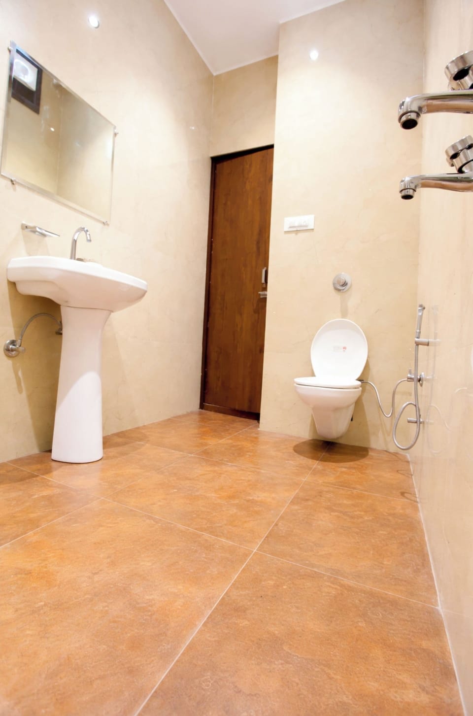Shower, rainfall showerhead, slippers, towels