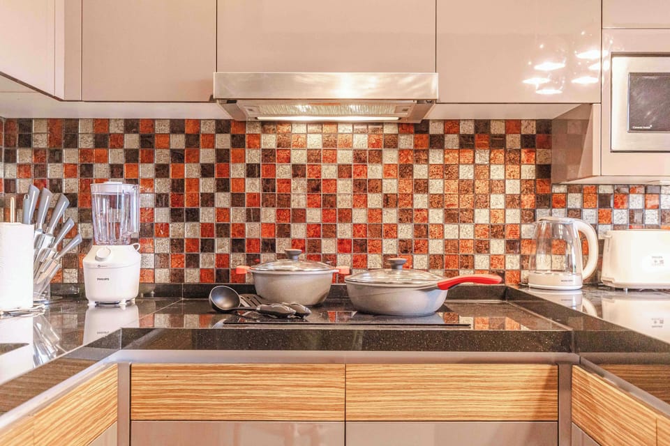 Comfort Apartment, Balcony, Garden View | Private kitchen | Espresso maker, electric kettle, highchair