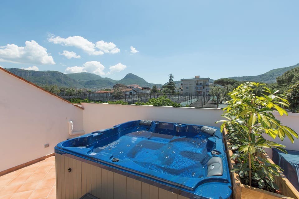Penthouse, Partial Sea View | Outdoor spa tub