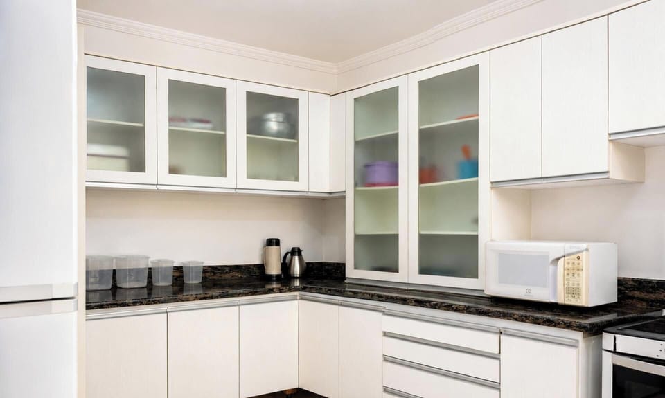 Honeymoon House, Pool Access, Garden View | Private kitchen | Fridge, microwave, cookware/dishes/utensils, dining table