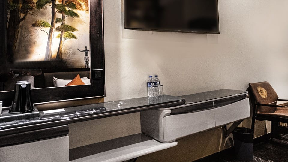 Economy Double Room | In-room safe, iron/ironing board, free WiFi
