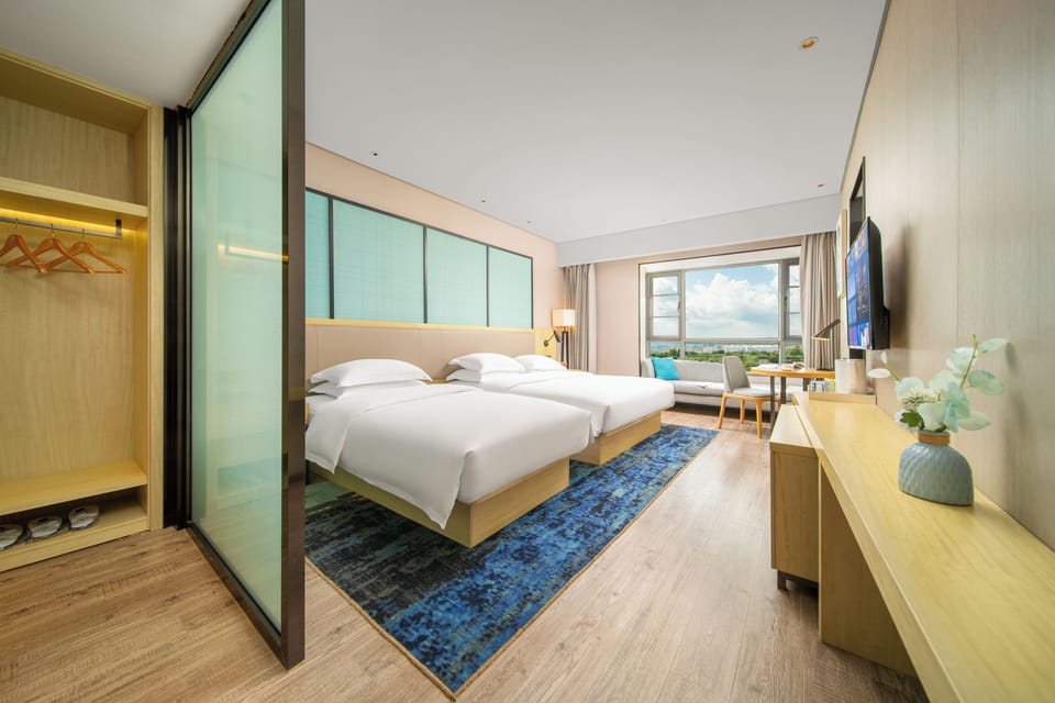 Premium bedding, down comforters, desk, laptop workspace