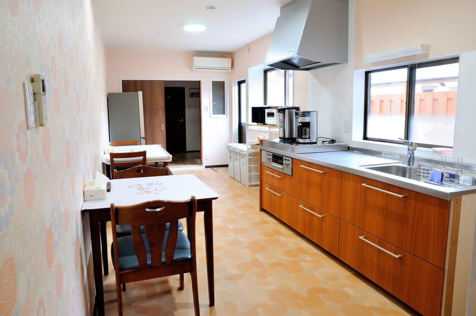 Full-size fridge, microwave, oven, paper towels