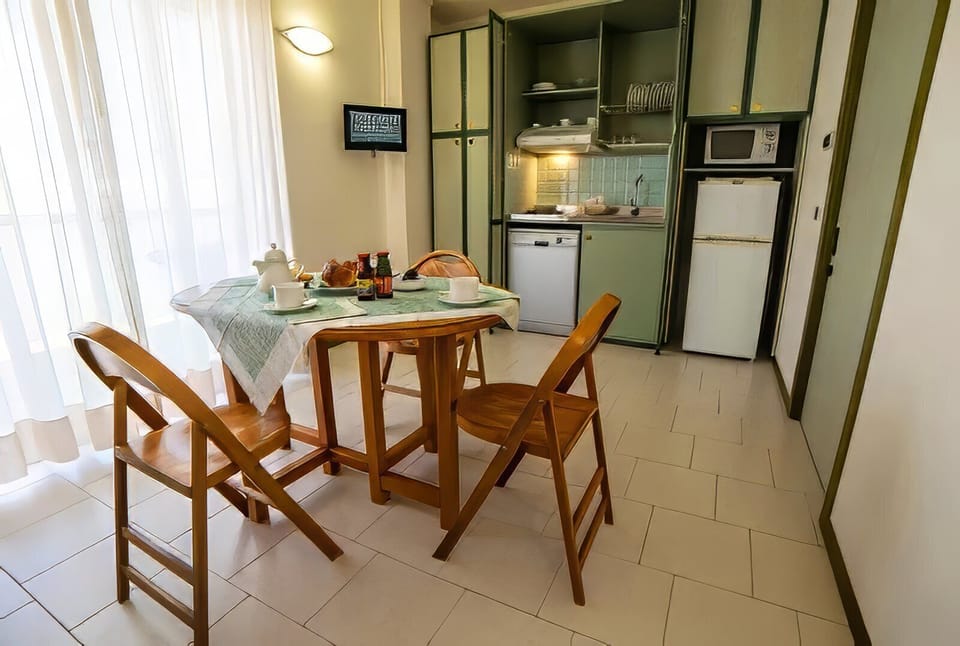 Comfort Apartment, Balcony, Partial Sea View | Living area | TV