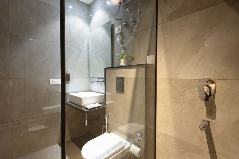 Luxury Studio, City View | Bathroom | Shower, free toiletries, hair dryer, towels