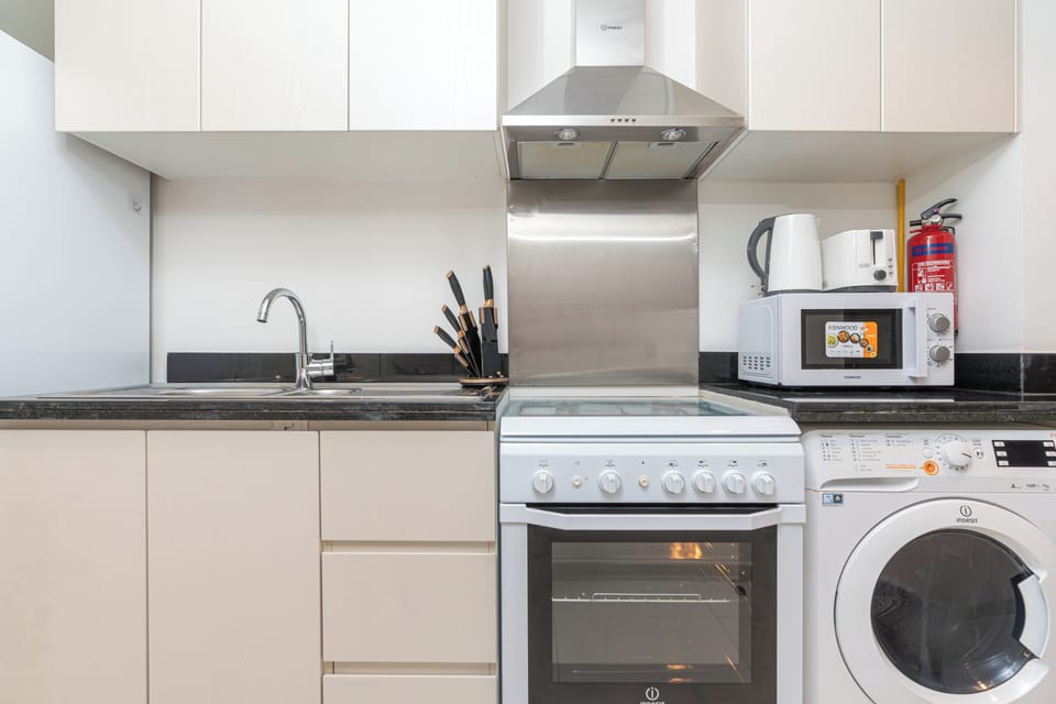Exclusive Studio, Non Smoking, City View | Private kitchen | Full-size fridge, microwave, oven, stovetop