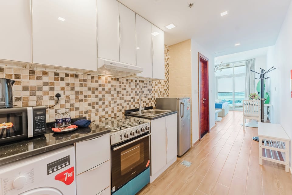 Exclusive Studio, Non Smoking, City View | Private kitchen | Full-size fridge, microwave, oven, stovetop