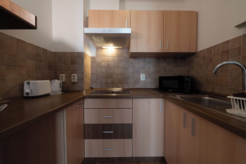 Mini-fridge, microwave, cookware/dishes/utensils