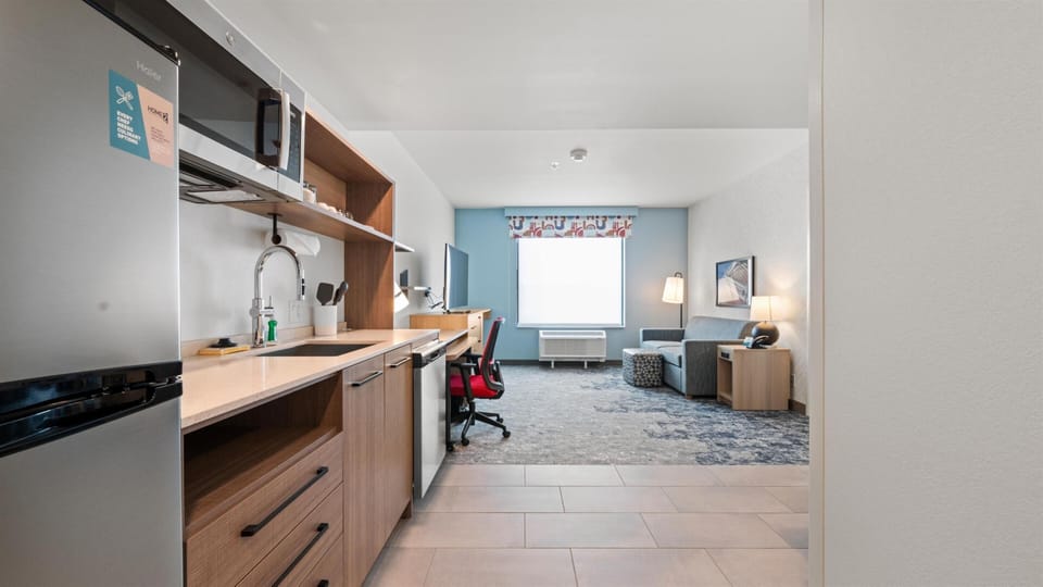 Suite, 1 Bedroom | Living area | TV