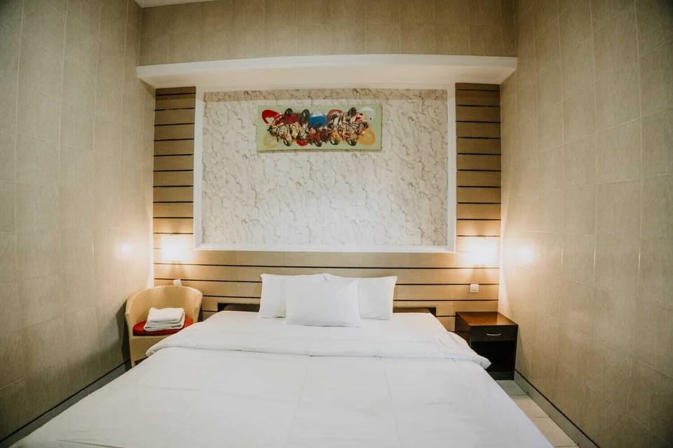 Deluxe Double Room, Pool View | Desk, laptop workspace, free WiFi
