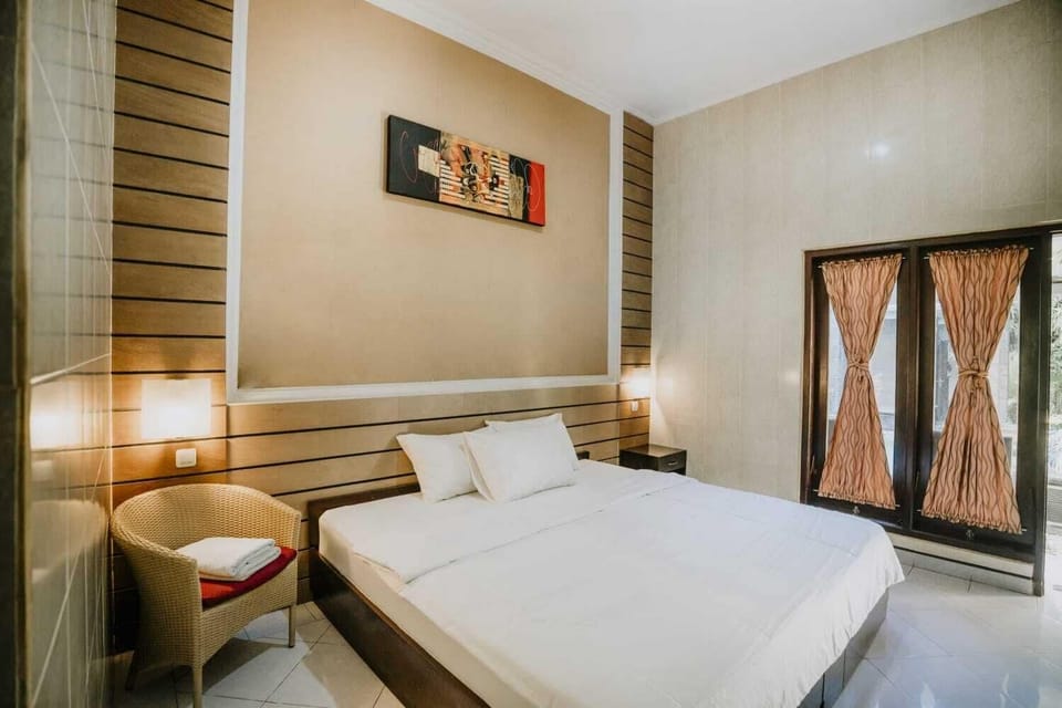 Deluxe Double Room, Pool View | Desk, laptop workspace, free WiFi