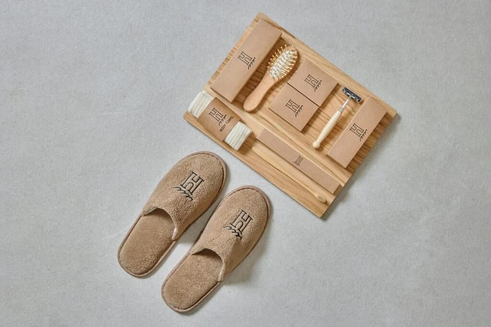Separate tub and shower, free toiletries, hair dryer, slippers