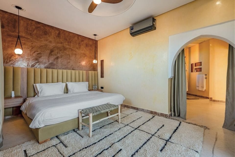 Premium bedding, free minibar items, in-room safe, laptop workspace