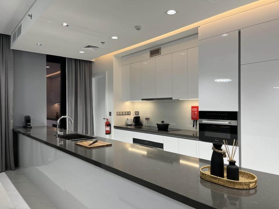 Deluxe Apartment, 3 Bedrooms, Non Smoking | Private kitchen | Coffee/tea maker, electric kettle, toaster, highchair