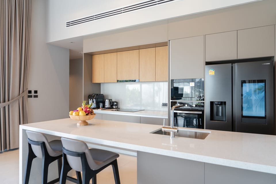 Deluxe Villa, Pool View | Private kitchen | Coffee/tea maker, electric kettle