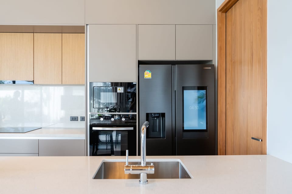 Deluxe Villa, Pool View | Private kitchen | Coffee/tea maker, electric kettle