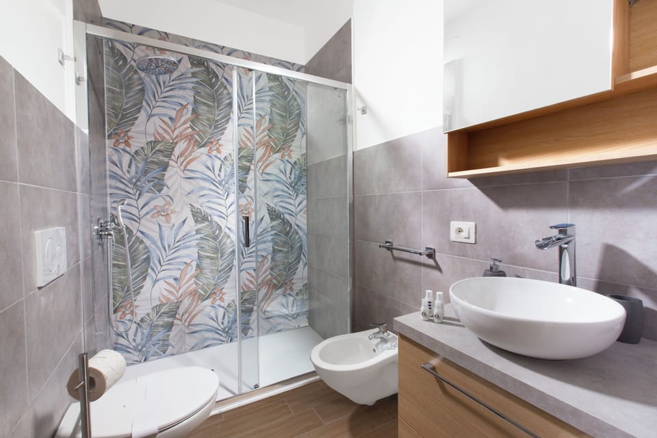 Apartment, 2 Bedrooms, Balcony | Bathroom | Shower, free toiletries, hair dryer, bidet