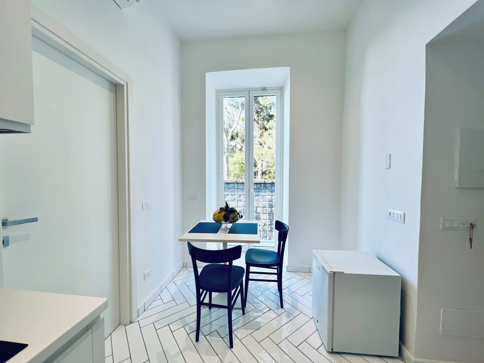 Apartment, Balcony, Partial Sea View | Living area | 32-inch flat-screen TV with digital channels