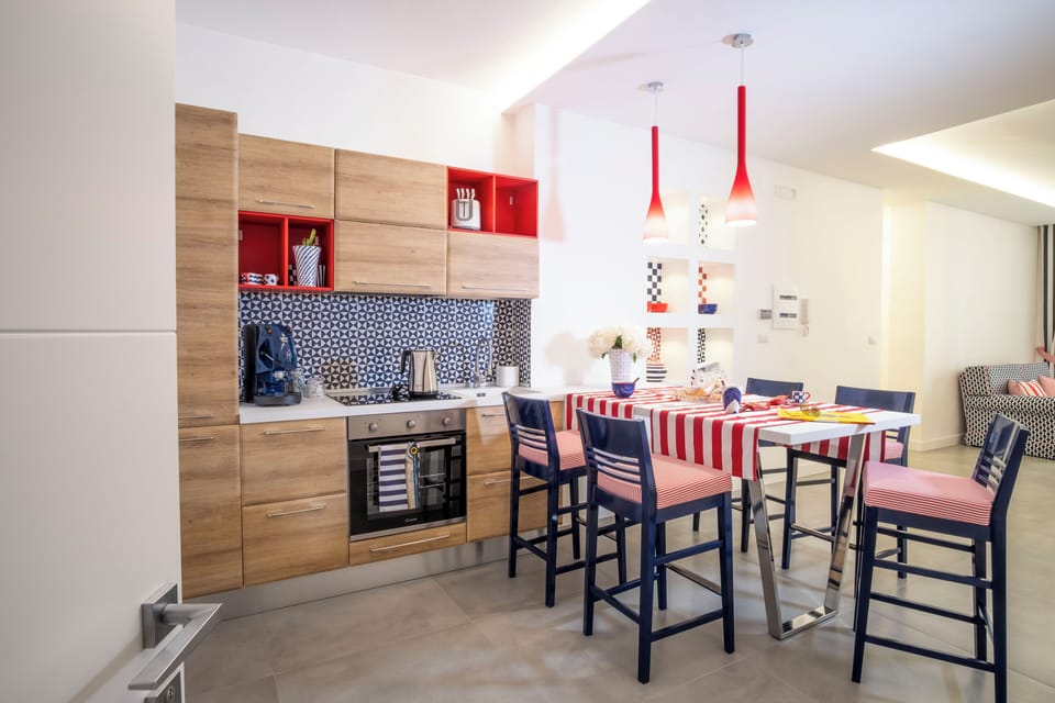 Deluxe Apartment, 4 Bedrooms, City View | Private kitchen | Oven, stovetop, espresso maker, electric kettle