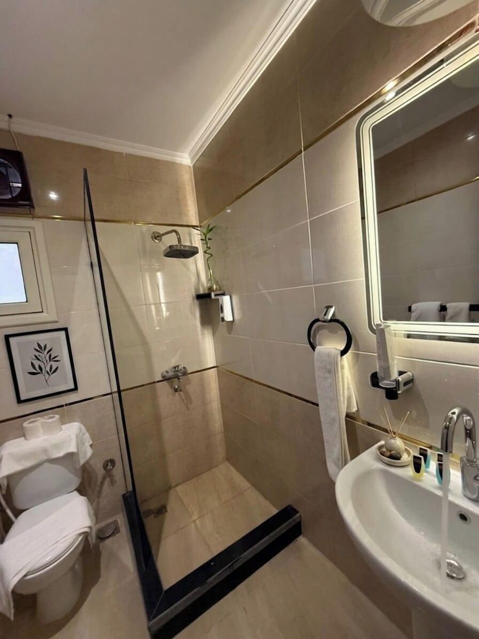 Deluxe Quadruple Room, City View | Minibar, soundproofing, bed sheets