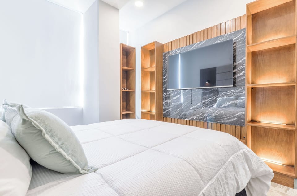 Deluxe Suite, City View | Laptop workspace, iron/ironing board, WiFi (free)
