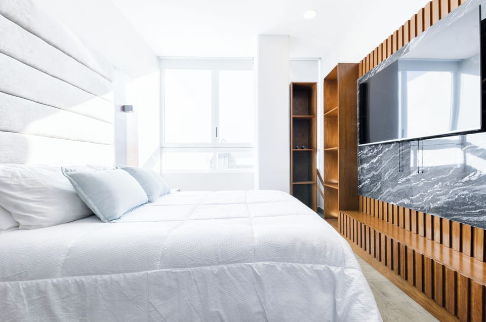 Deluxe Suite, City View | Laptop workspace, iron/ironing board, WiFi (free)