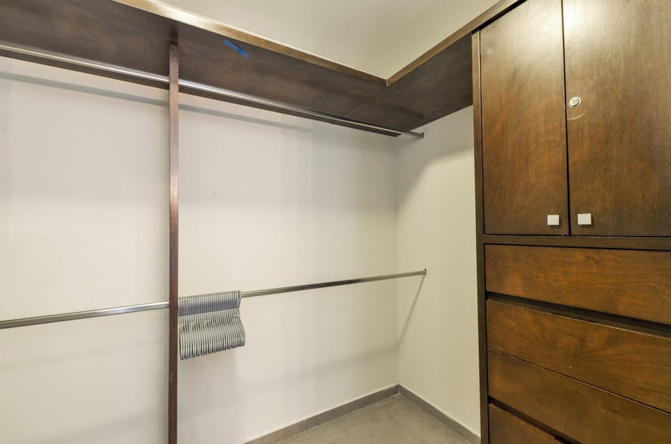Comfort Suite, Balcony, City View | Wardrobe