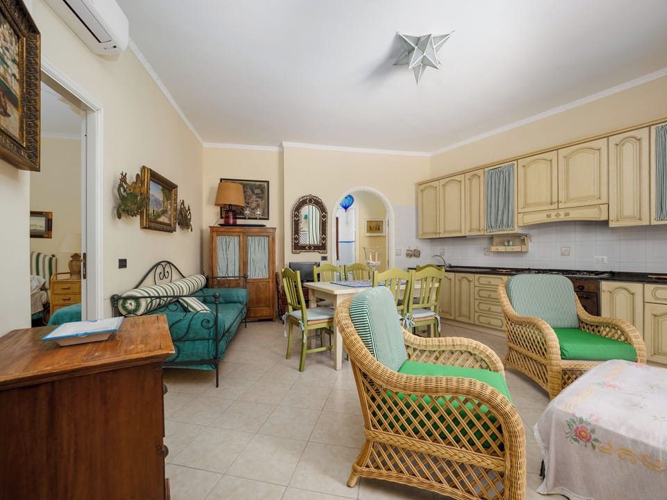 Panoramic House, City View | Living area | 32-inch flat-screen TV with digital channels