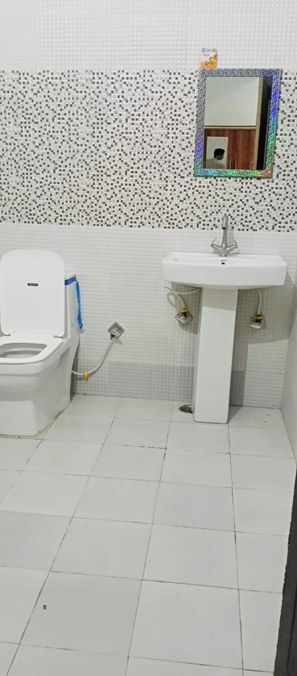Shower, rainfall showerhead, slippers, towels