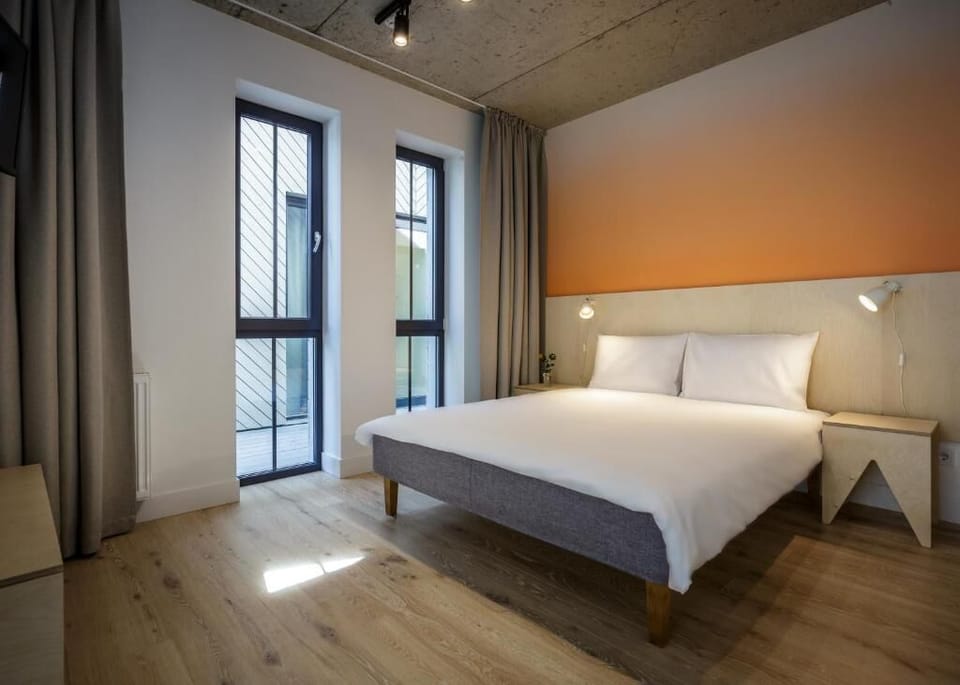 Double Room, City View | Iron/ironing board, free WiFi, wheelchair access