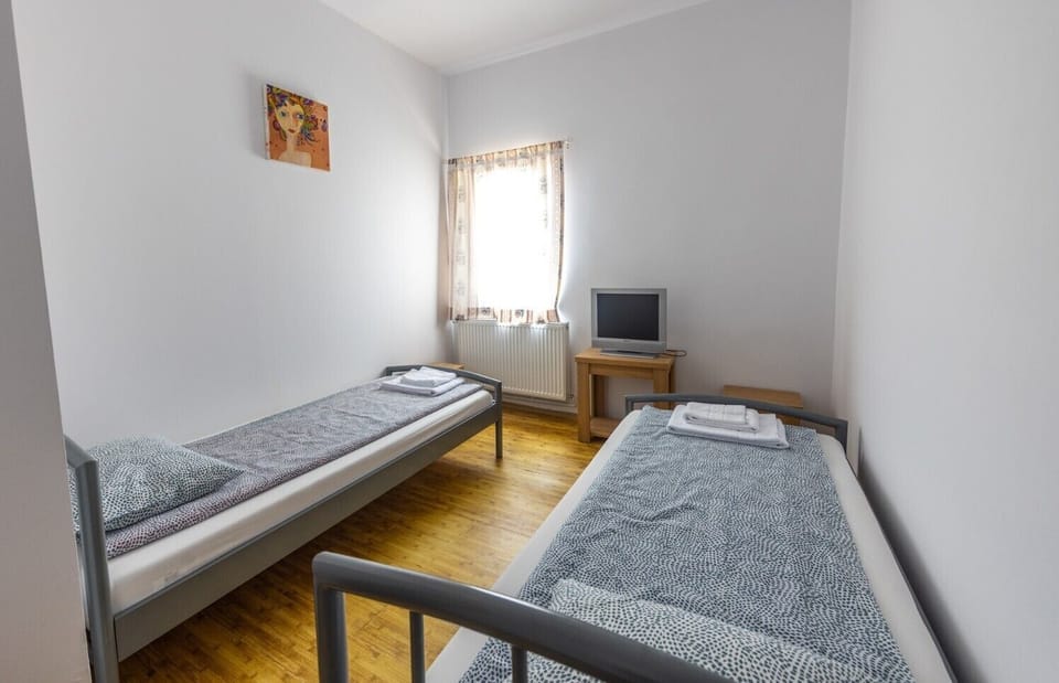 Classic Twin Room, Garden View | Iron/ironing board
