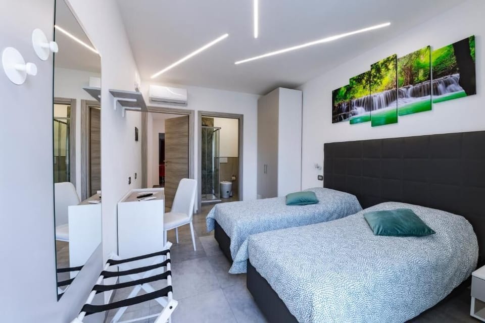 Double or Twin Room, Air conditioning | In-room safe, desk, laptop workspace, blackout drapes