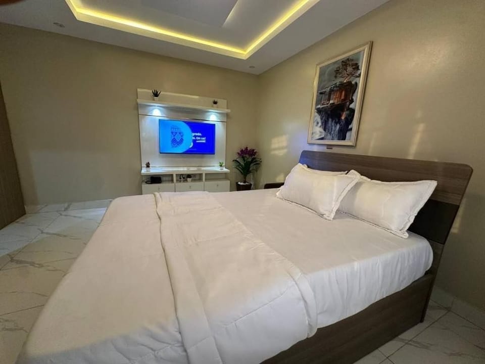 Family Room, Balcony, City View | Desk, laptop workspace, blackout drapes, soundproofing