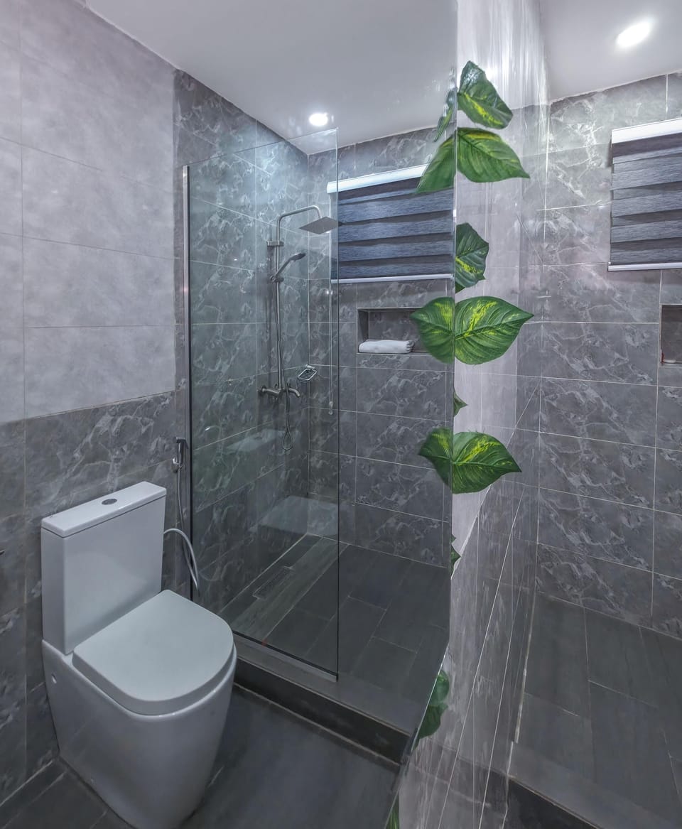 Family Room, Balcony, City View | Bathroom | Free toiletries, hair dryer, towels, soap