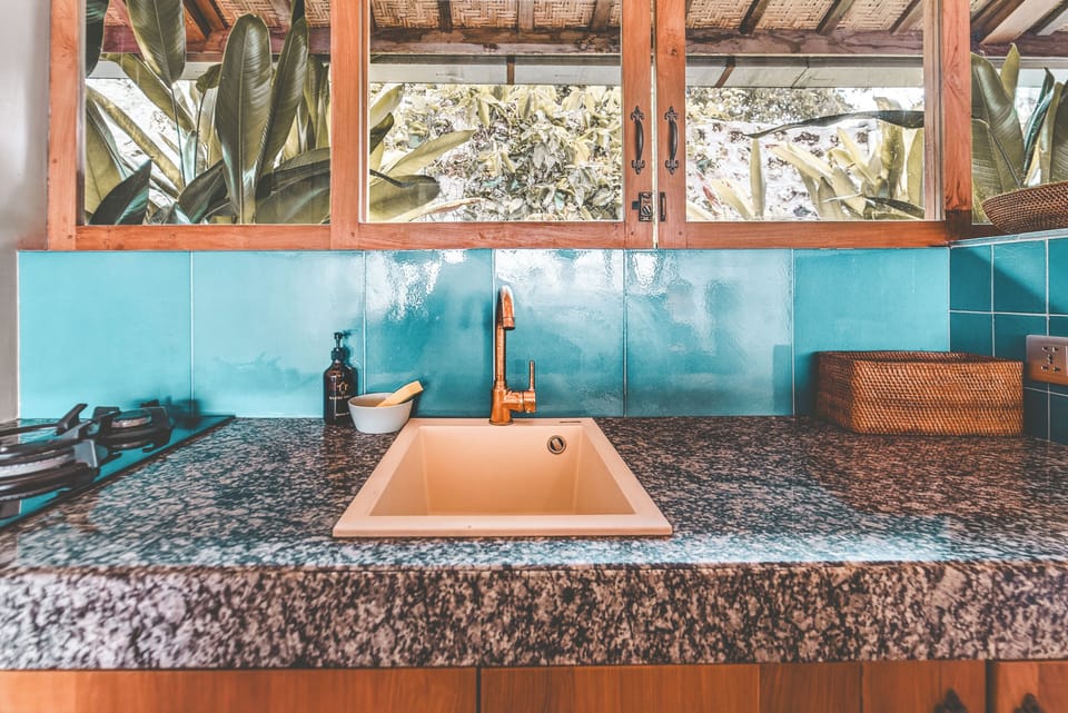 Double Room, Patio, Pool View | Private kitchen | Fridge, electric kettle, toaster, cookware/dishes/utensils